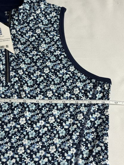 1764 Signature floral polo laid flat with tape across the chest