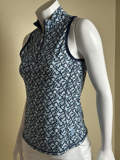 Side view of 1764 Signature floral polo showing navy armhole trim and seam details
