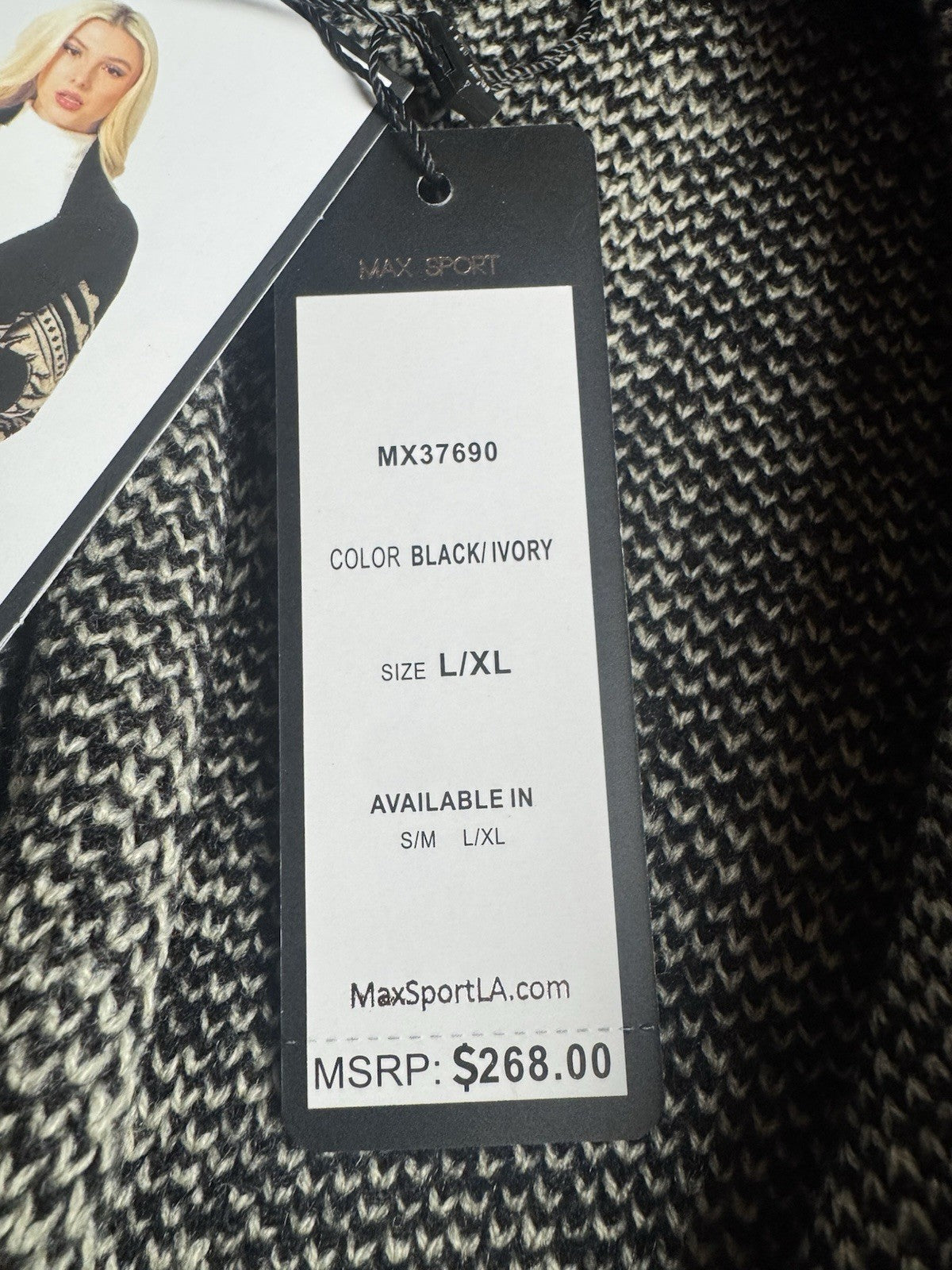 $268 Max Sport Poncho Black/Ivory Sz L/XL.      (B.144/1)