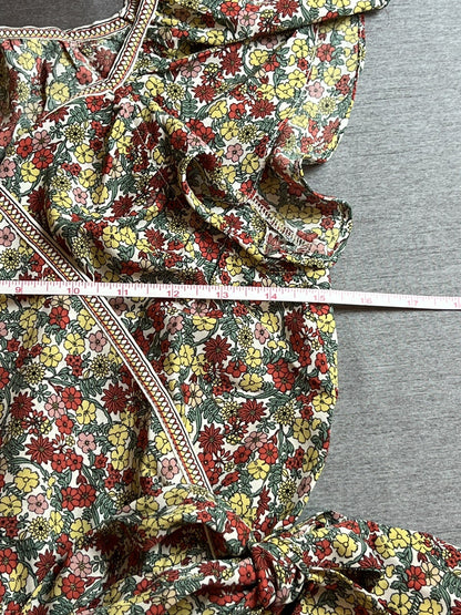 Max Studio floral blouse laid flat with measurement tape