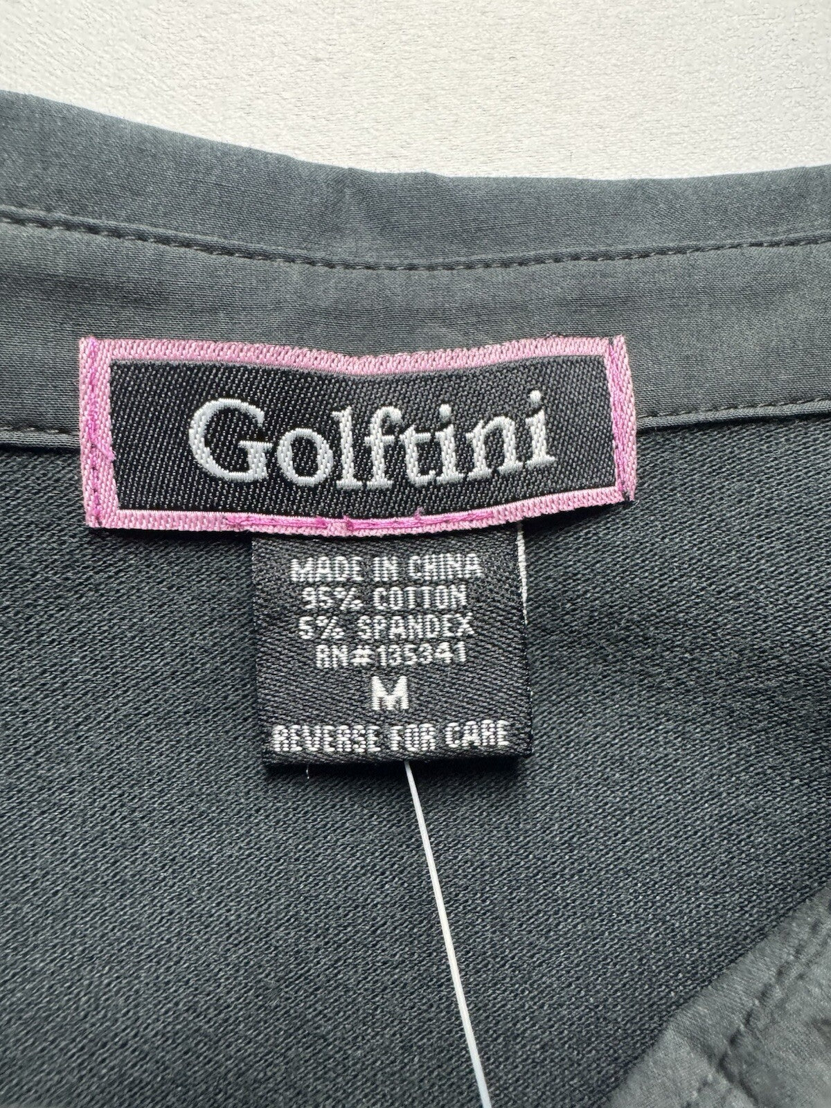 Golftini Women’s Golf shirt Sz M.   (B.139)