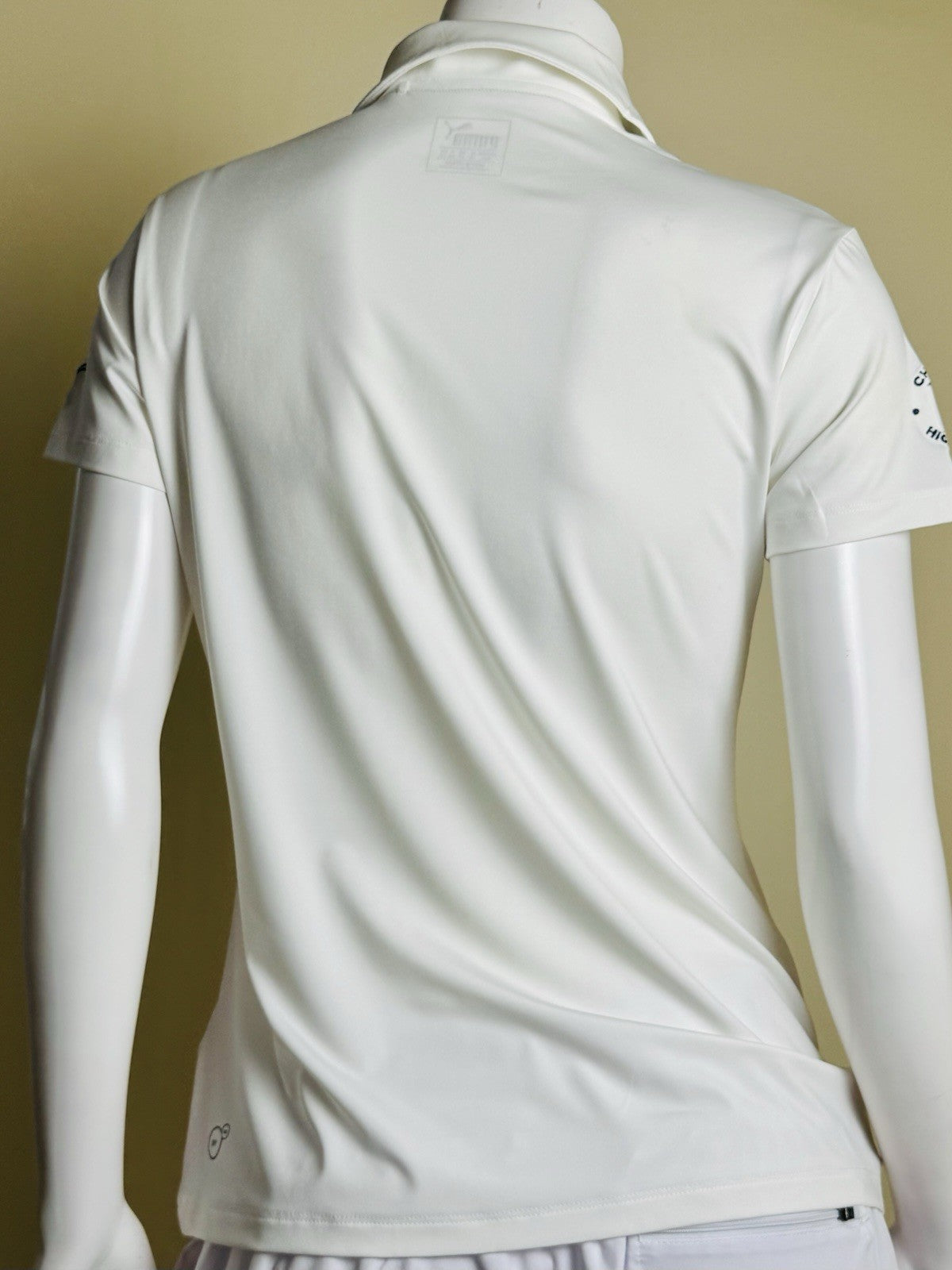 $60 Puma Women’s Golf Shirt Sz M.   (B.189)