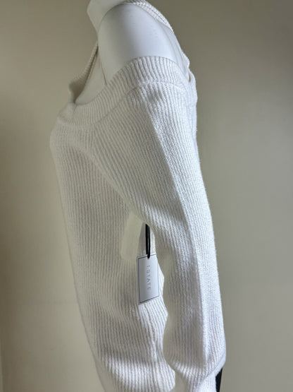 Side view of 1.STATE white sweater showing open shoulder and long sleeve