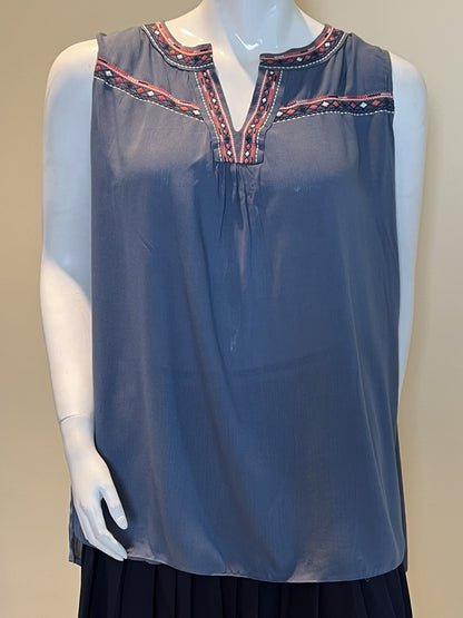 Front of Whispers blue sleeveless top with decorative neckline trim