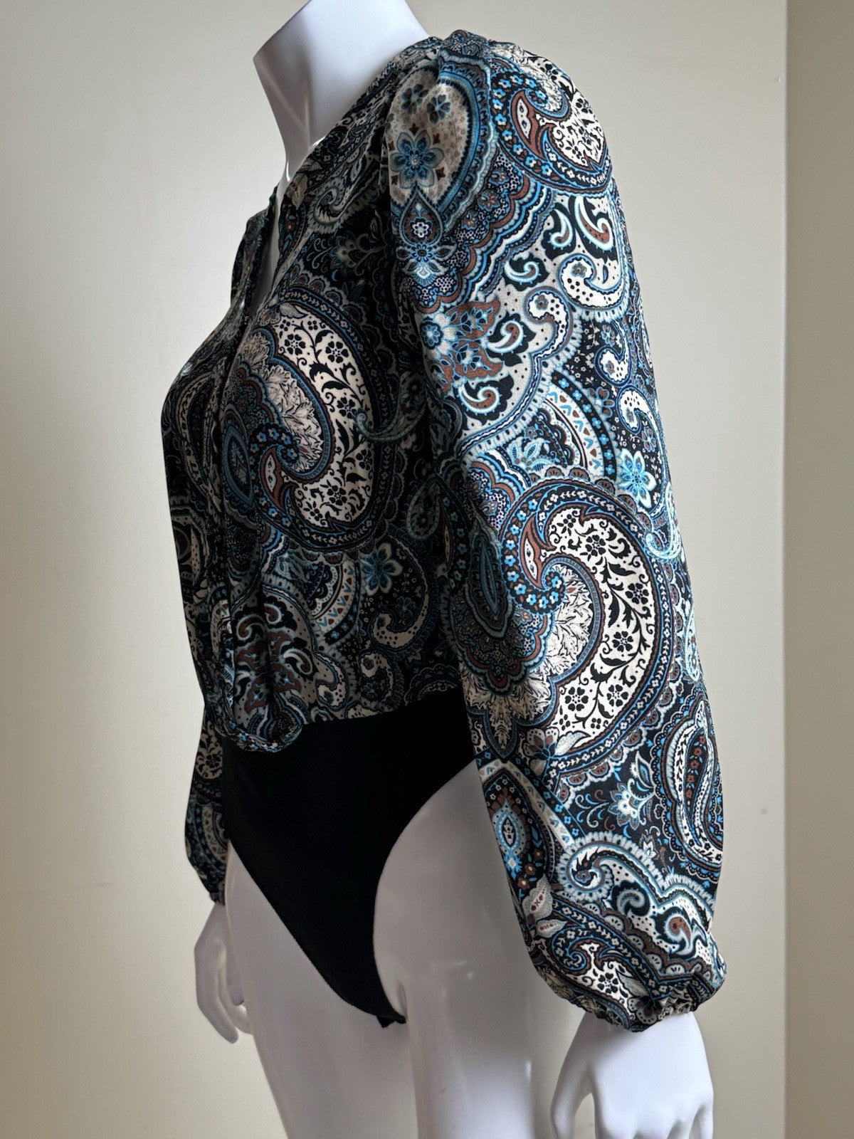 By Design Bodysuit Floral Long Sleeve Size L.      (B.184)