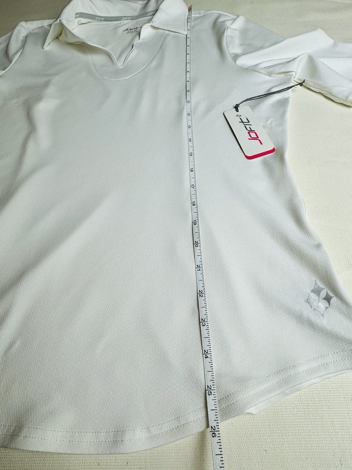 JOFIT WOMEN'S WHITE SCALLOPED V NECK GOLF SHIRT SZ L.  (48)