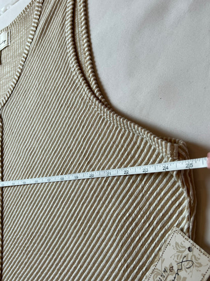 French Laundry striped top laid flat with horizontal measurement tape