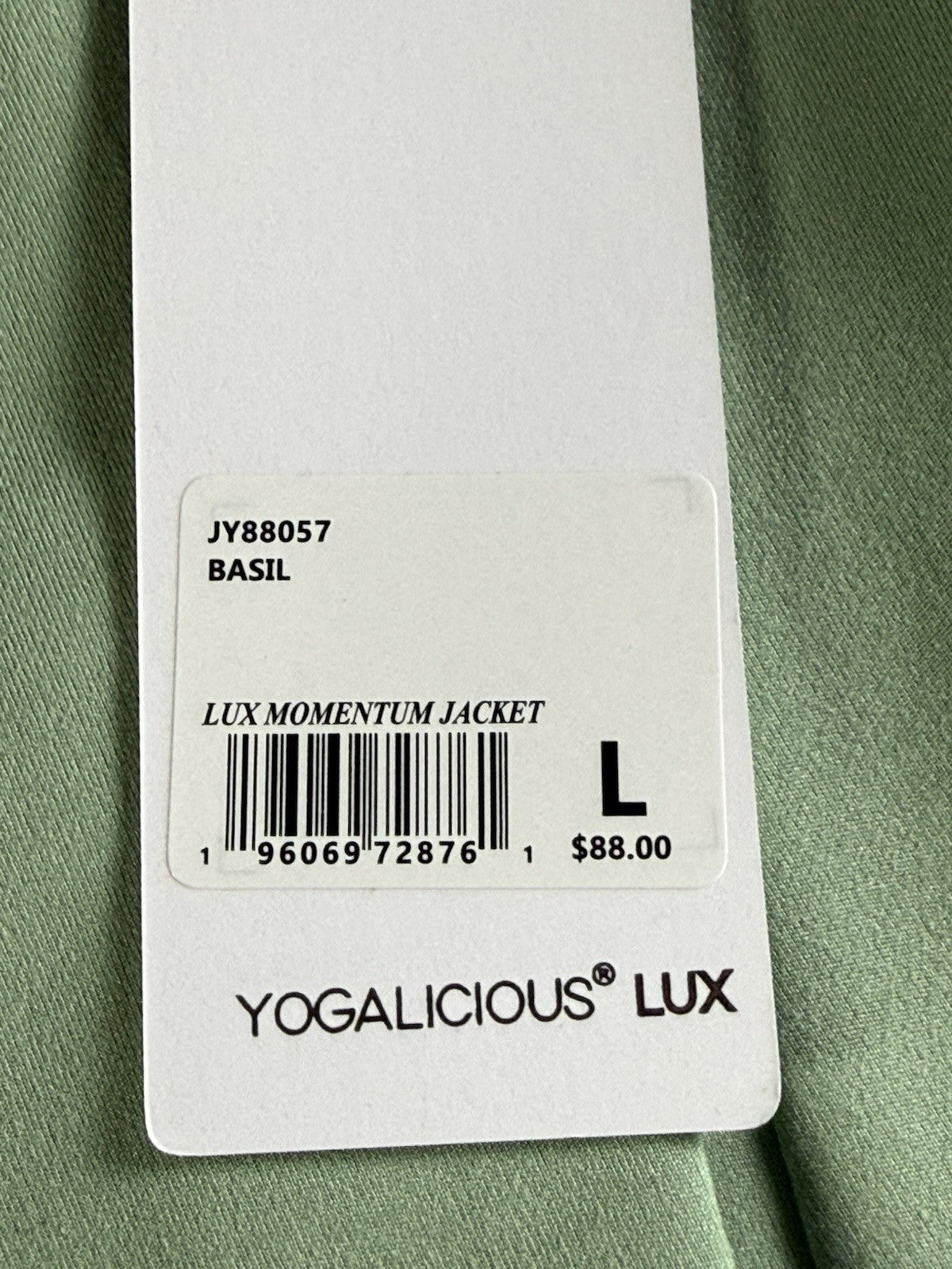 $88 Yogalicious women’s full zip performance jacket  size L. (B.194)