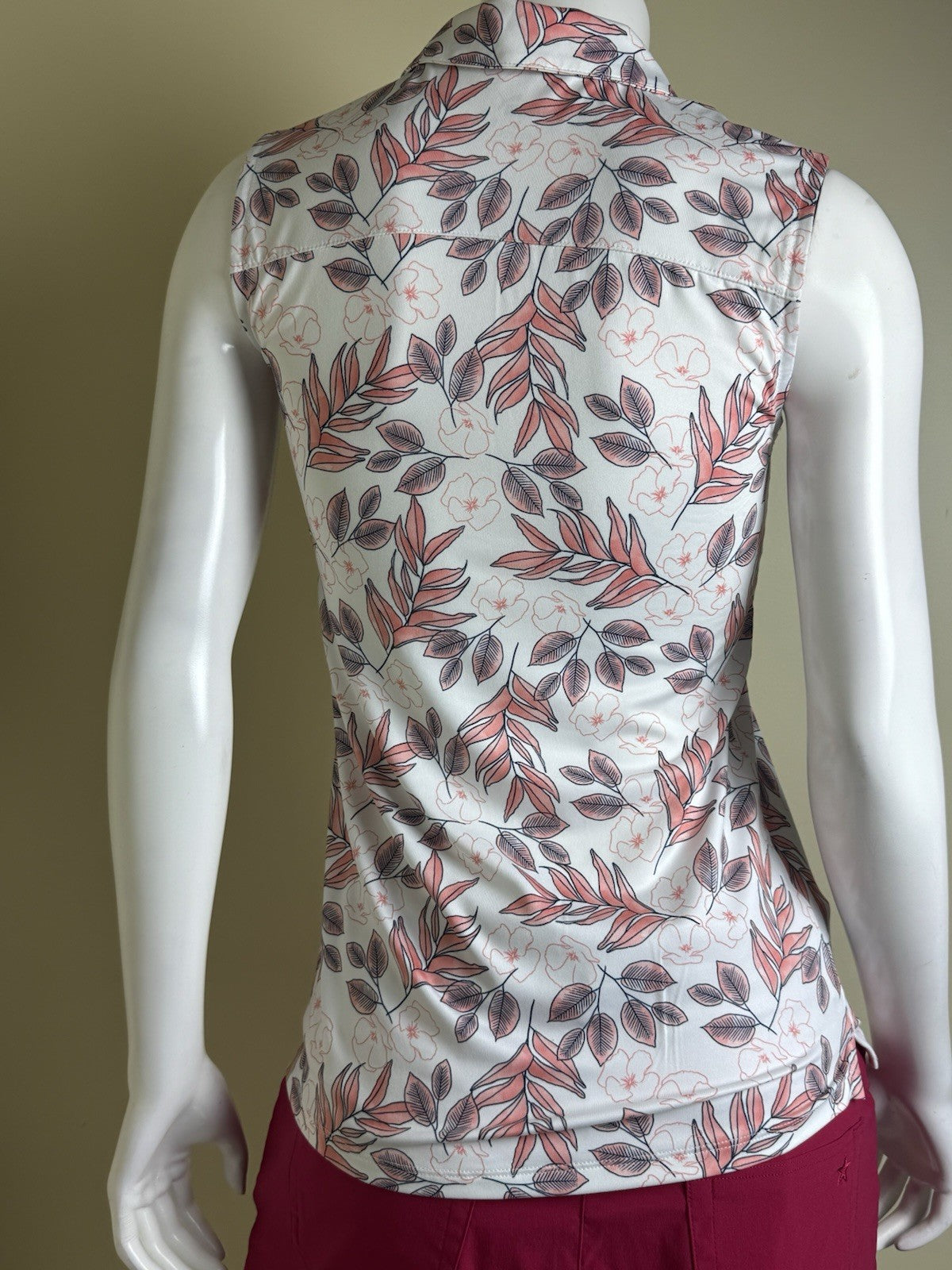 $60 Puma Women’s Golf Shirt Sleeveless Sz XS.  (B.153)