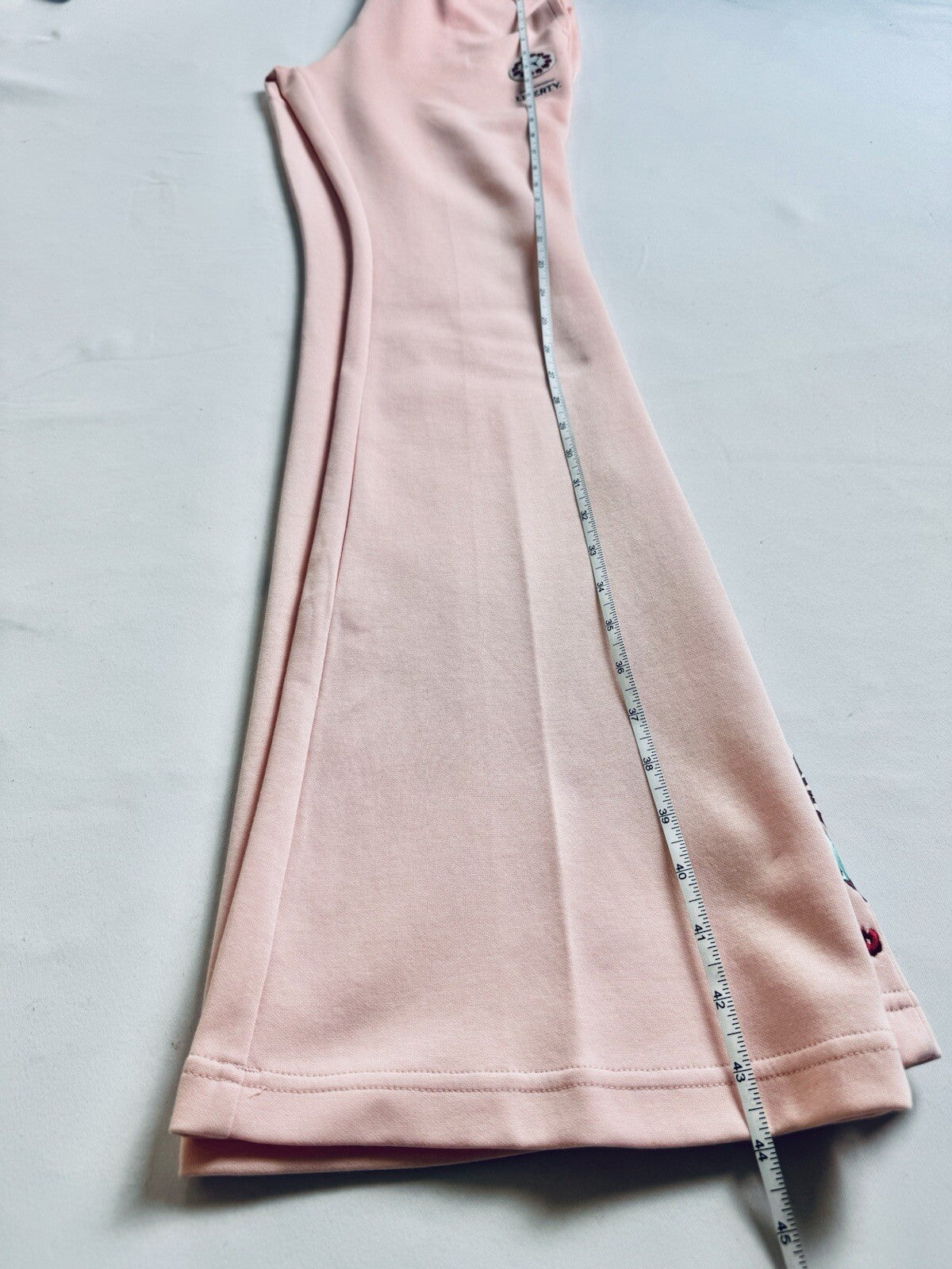 Puma Liberty Women’s Pink Wide Leg Pants Floral Embroidery Size XS.   (B.105)