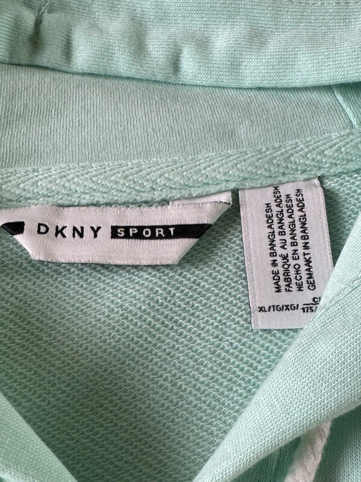 $79 DKNY Women’s logo Hooded Sweater Size XL.      (B.191)