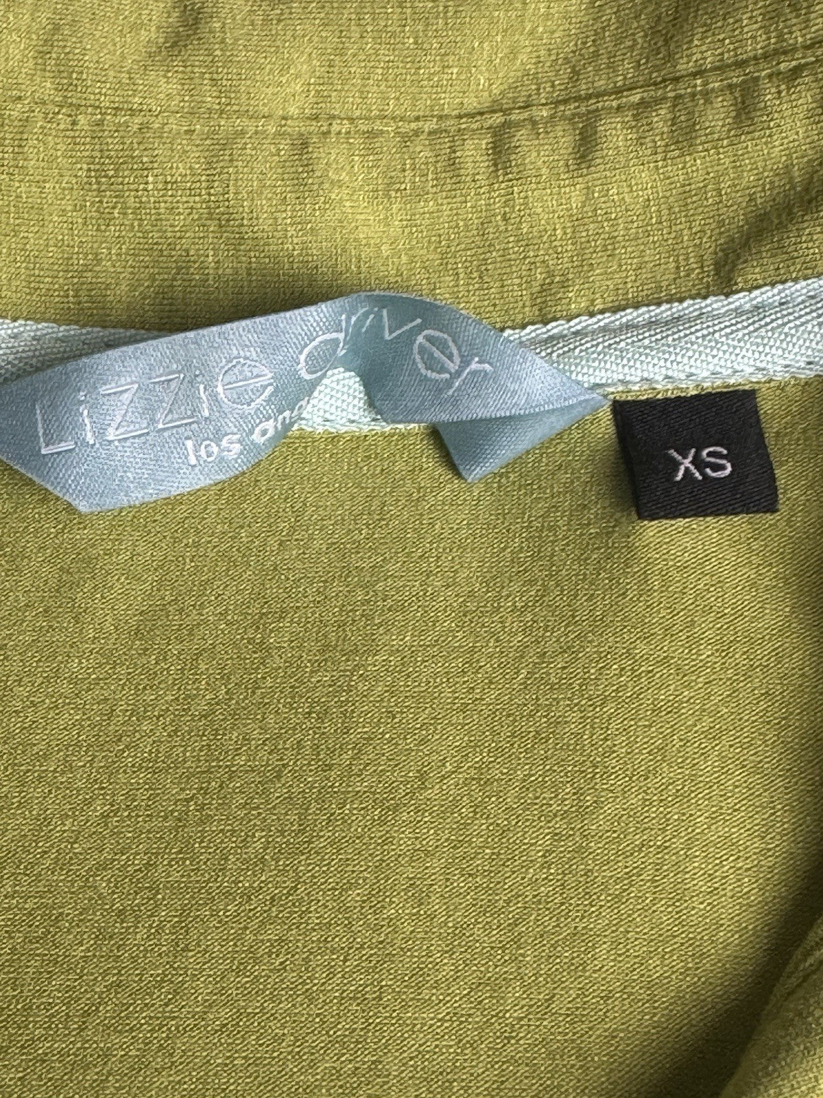 Lizzie Driver Golf Shirt Size XS.   (B.175)