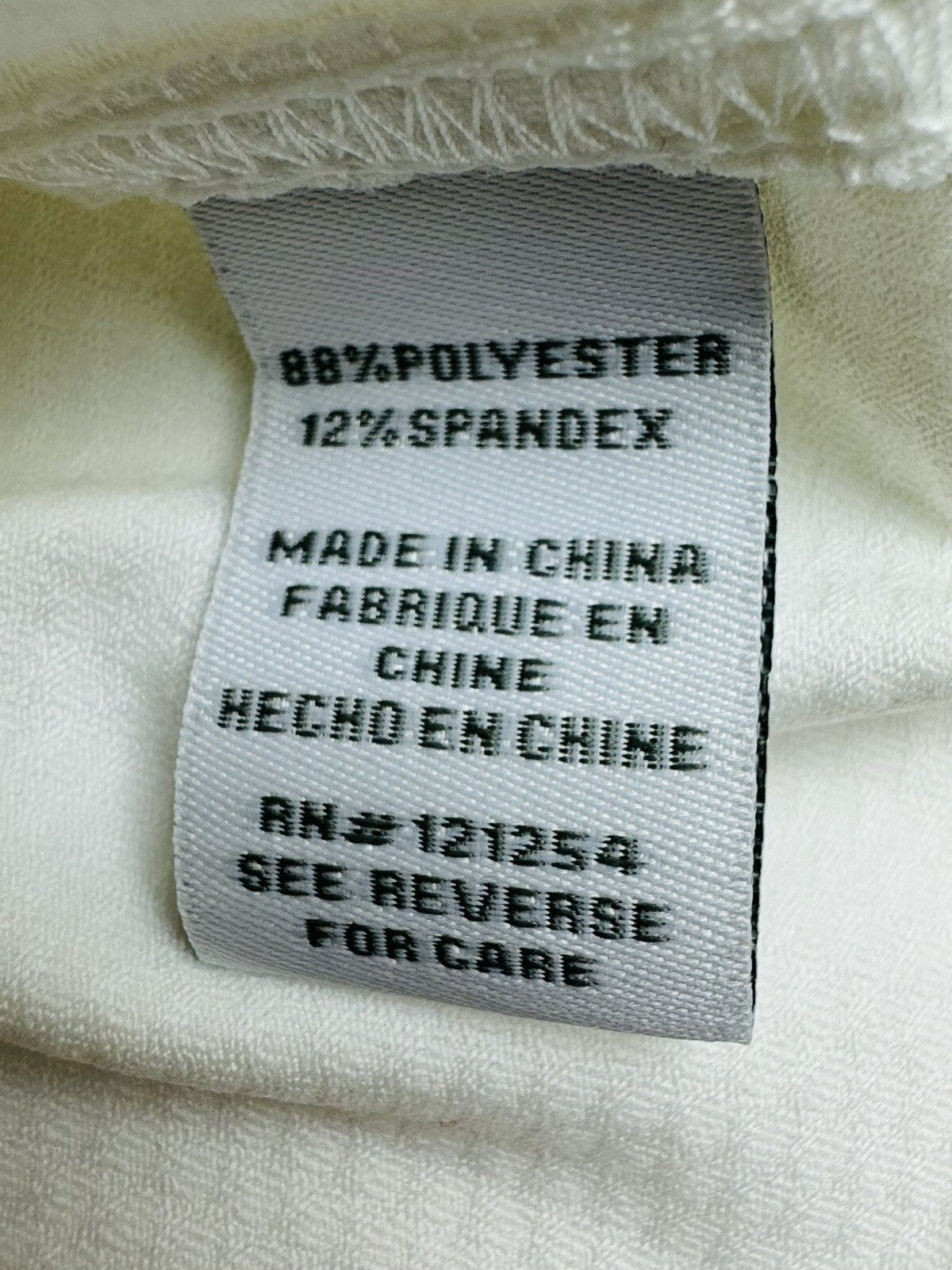 JOFIT WOMEN'S WHITE SCALLOPED V NECK GOLF SHIRT SZ L.  (48)