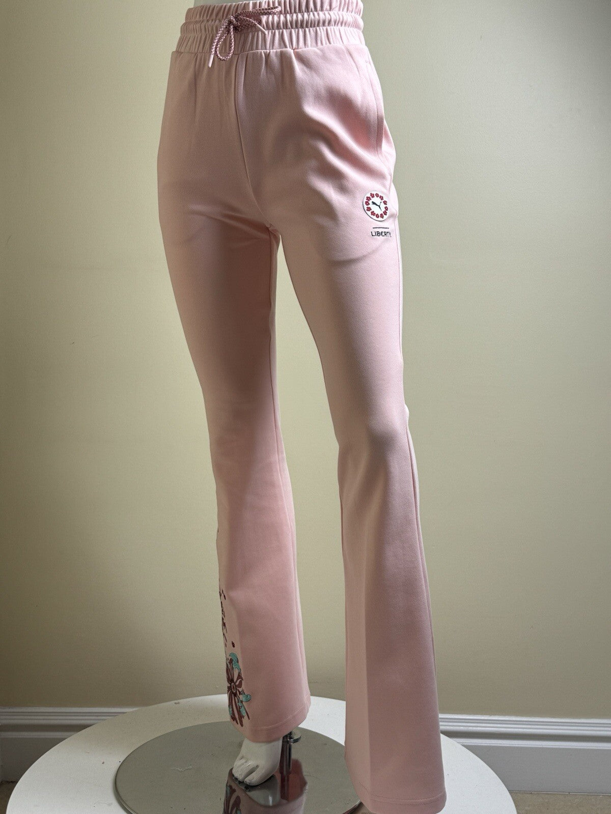 Puma Liberty Women’s Pink Wide Leg Pants Floral Embroidery Size XS.   (B.105)