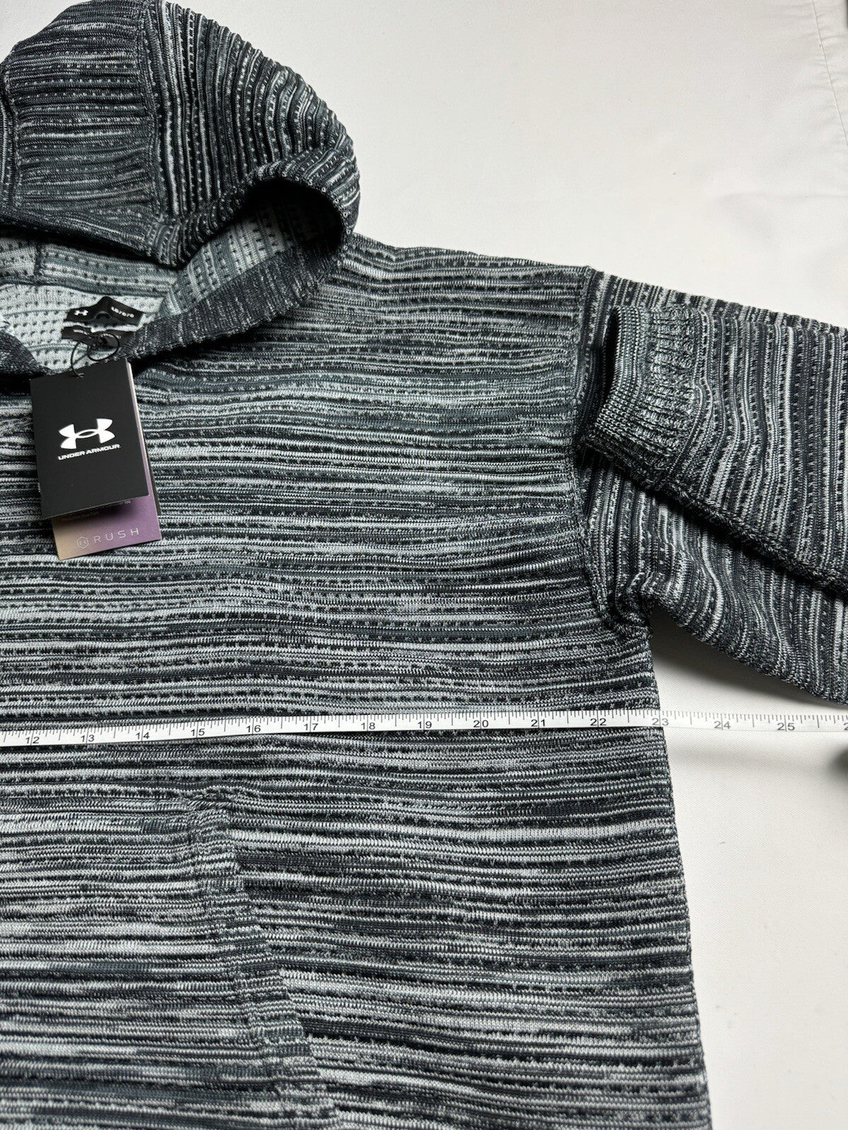 $150 Under Armour Women’s Hooded Sweater Size L.      (B.105)