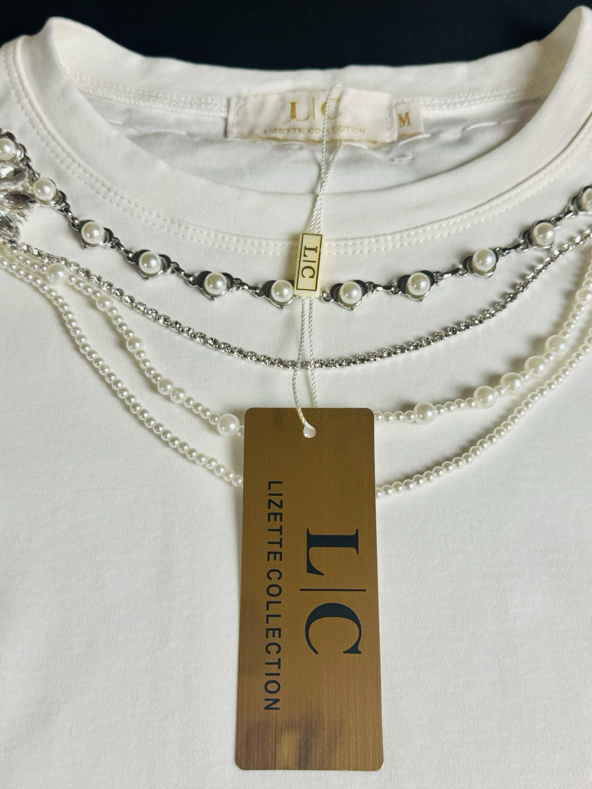 L/C Lizette Collection Ivory Rhinestones Women’s Shirt Sz M.     (B.181)