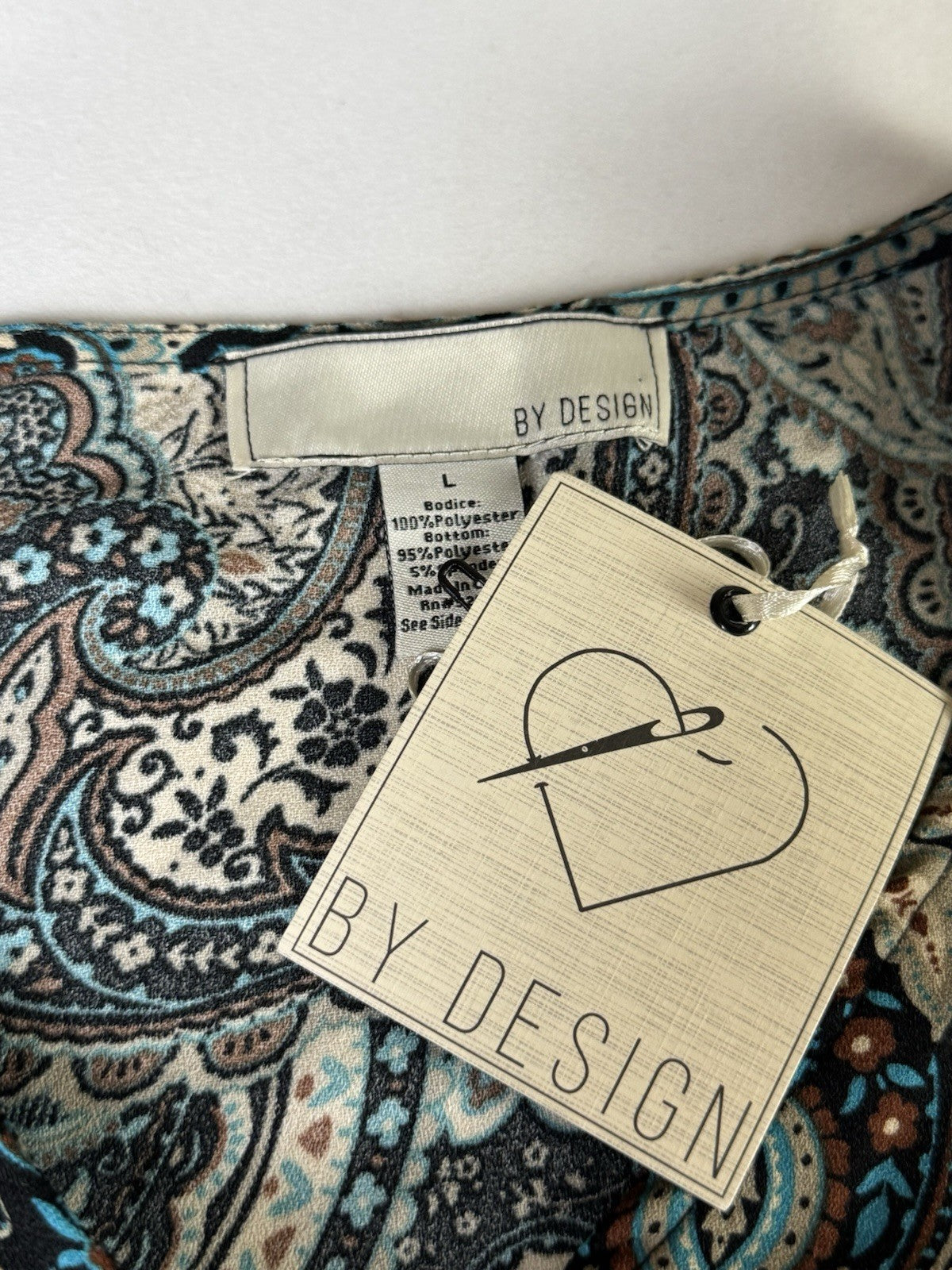 By Design Bodysuit Floral Long Sleeve Size L.      (B.184)