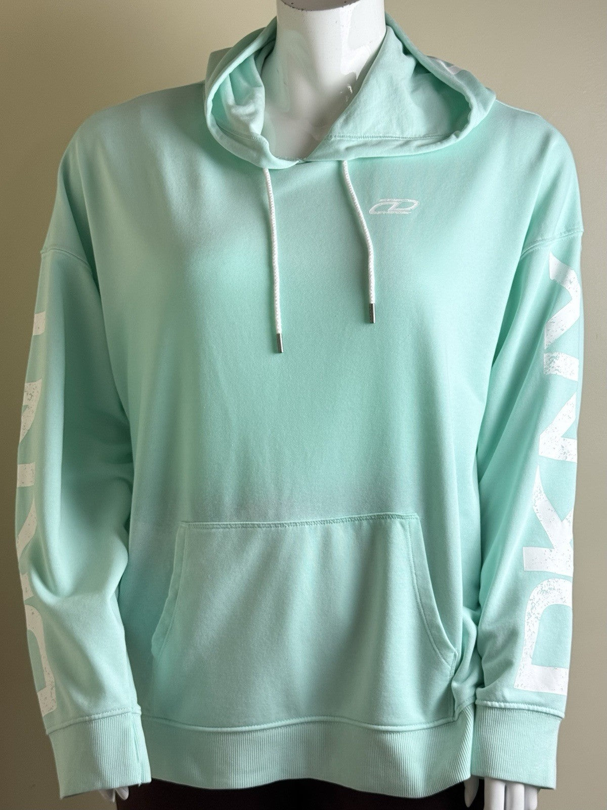 $79 DKNY Women’s logo Hooded Sweater Size XL.      (B.191)