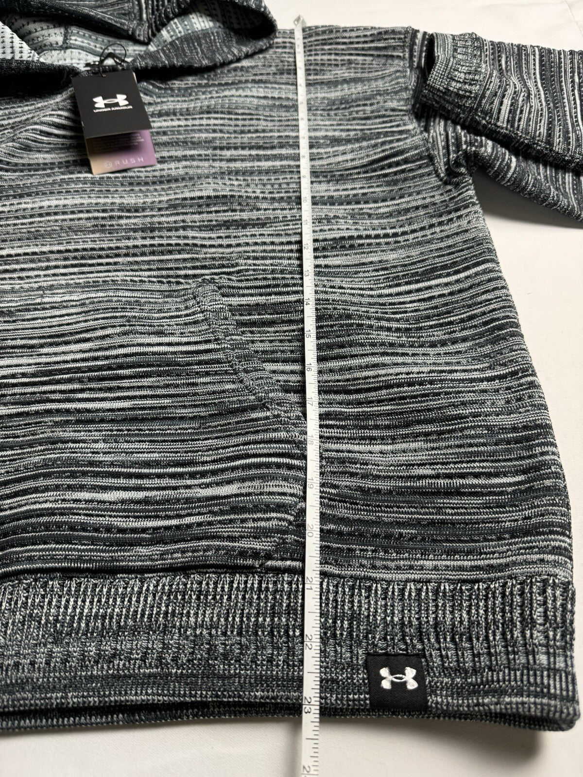 $150 Under Armour Women’s Hooded Sweater Size L.      (B.105)
