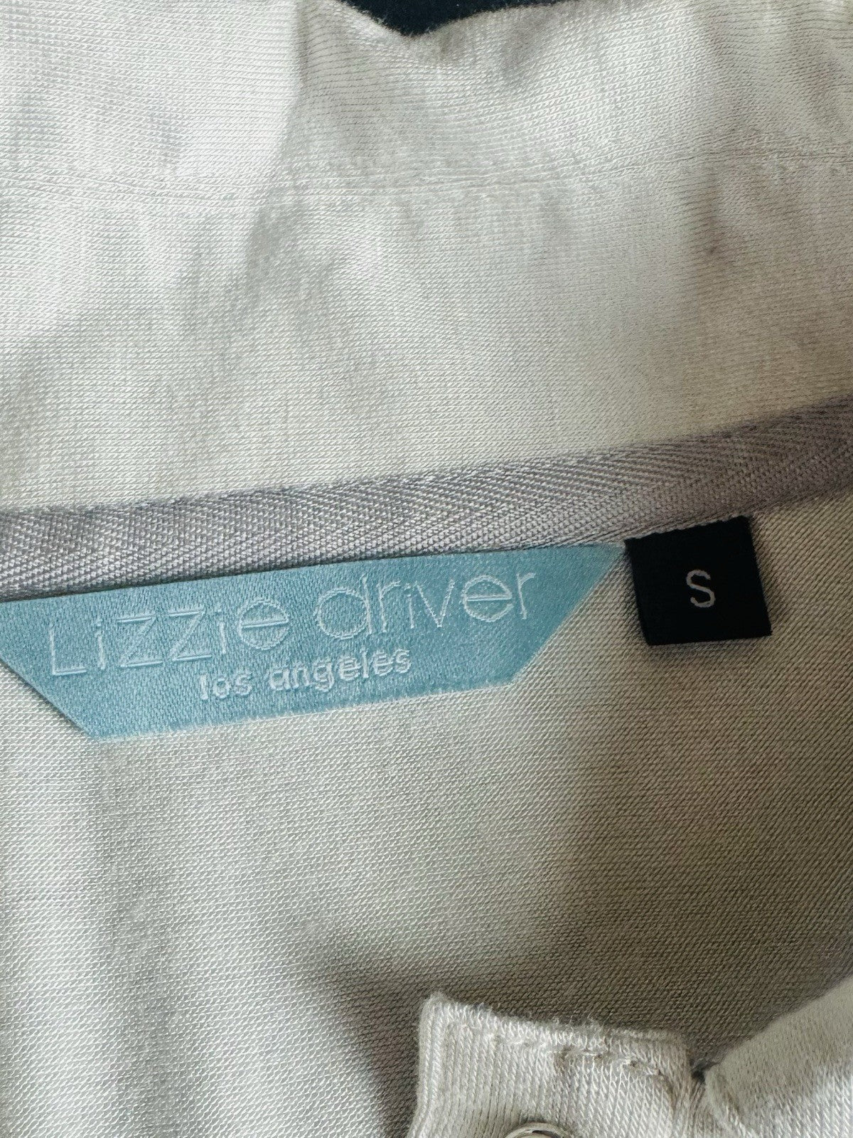 Lizzie Driver Golf Shirt Size S.   (B.181)