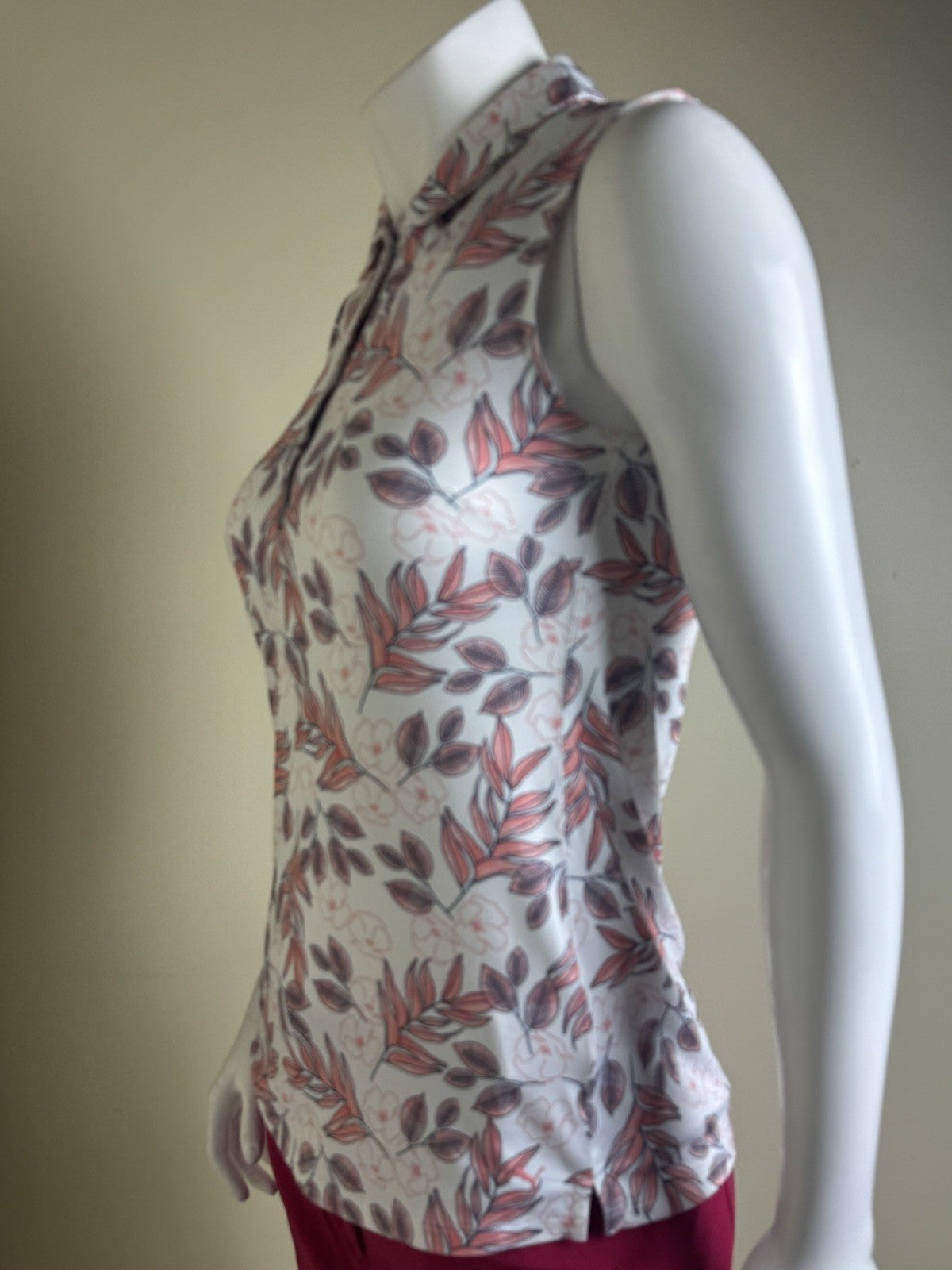 $60 Puma Women’s Golf Shirt Sleeveless Sz XS.  (B.153)