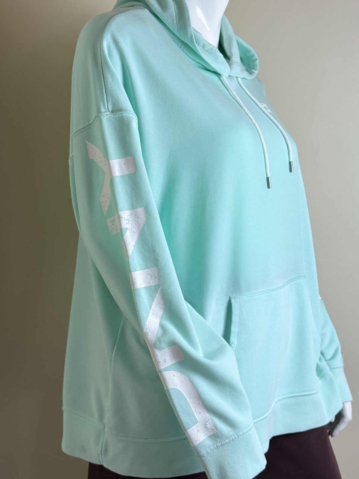 $79 DKNY Women’s logo Hooded Sweater Size XL.      (B.191)