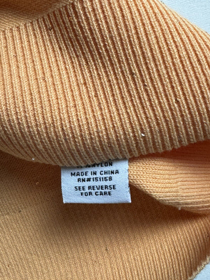 525 America cardigan label detail beneath ribbed cuff