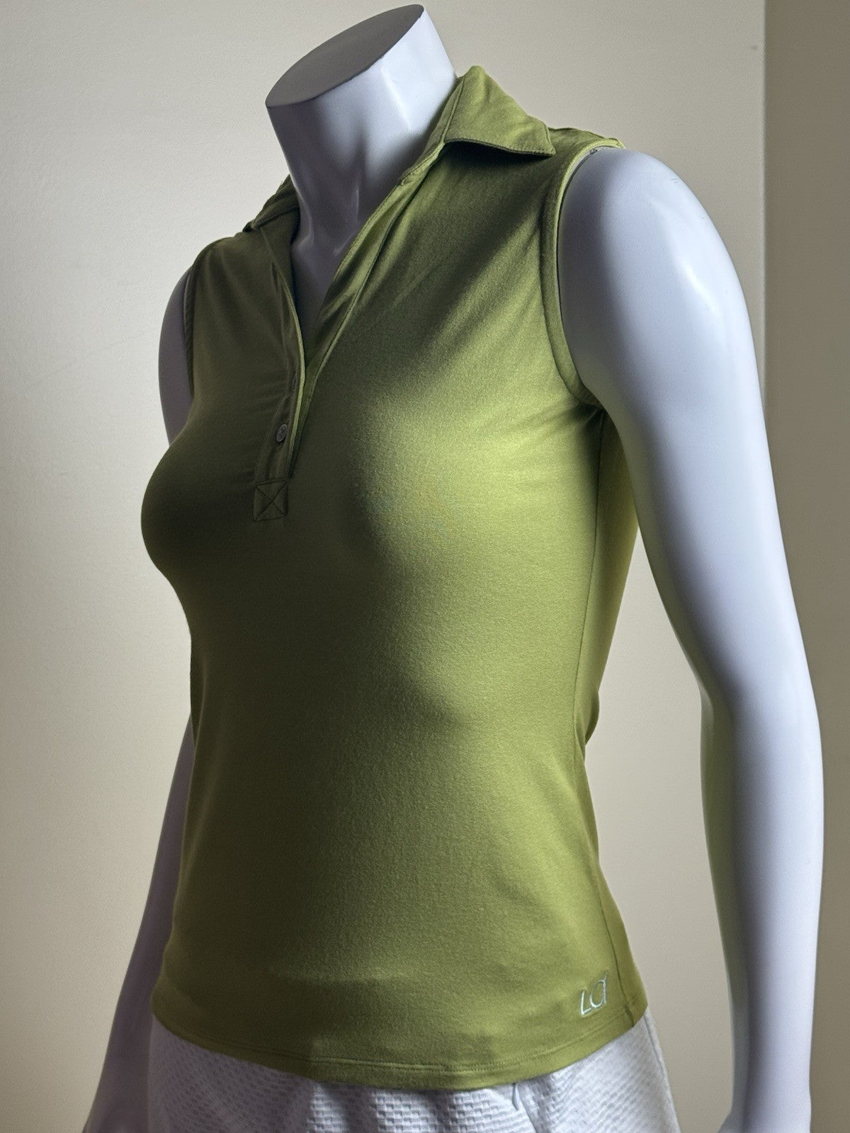 Lizzie Driver Golf Shirt Size XS.   (B.175)