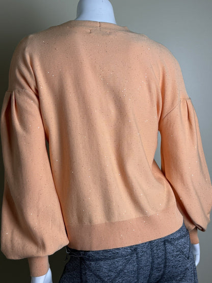 Back of 525 America Melon cardigan with ribbed hem