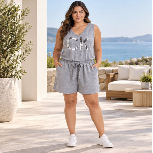 Calvin Klein women's gray 1X sequin logo romper front model view